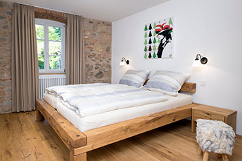 Schlafzimmer Ferienwohnung Mühlstein