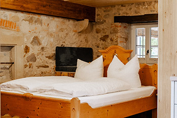 Schlafzimmer Ferienwohnung Mühlenchalet